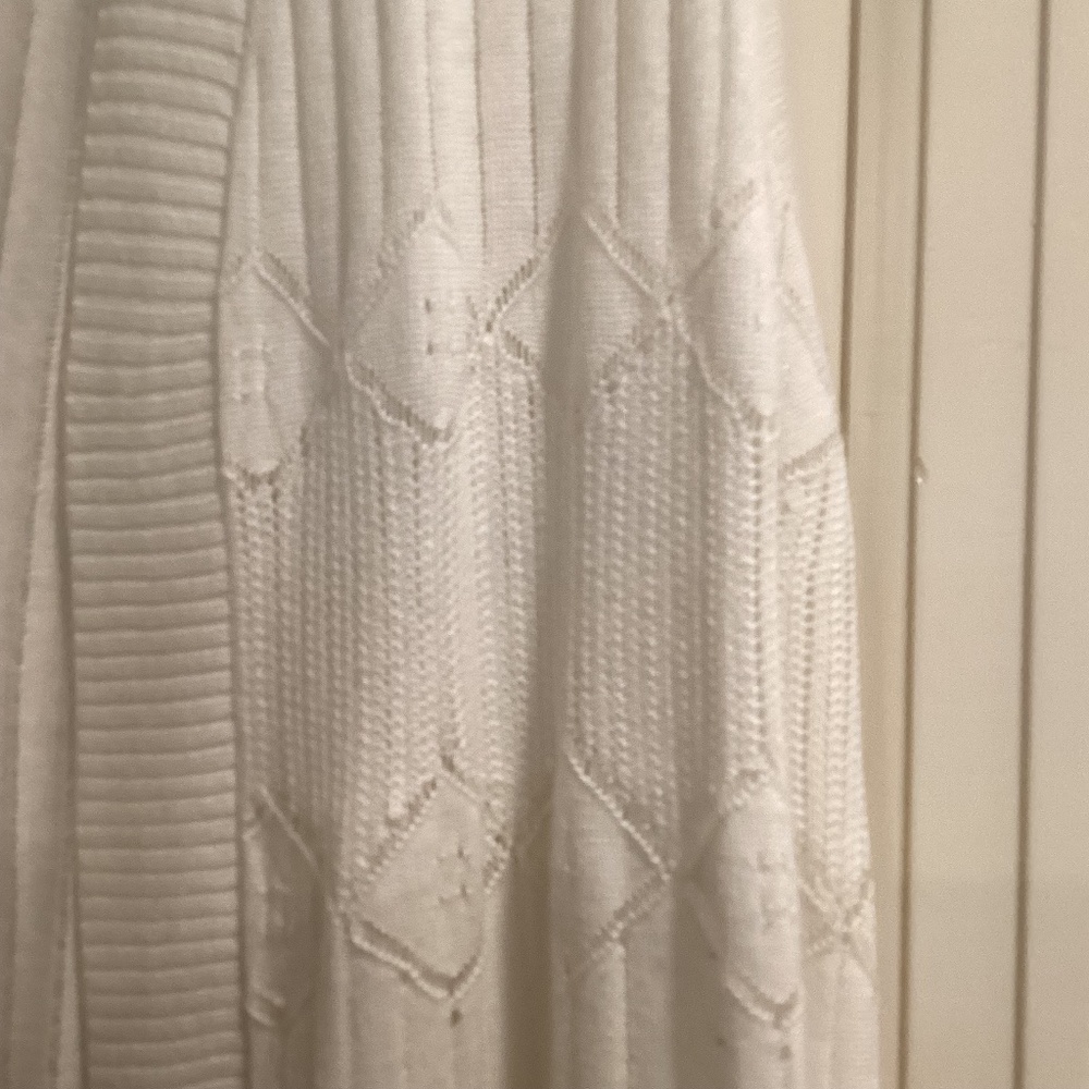Long white crocheted vest